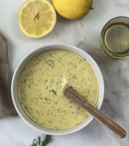 Small bowl of creamy lemon tahini dressing