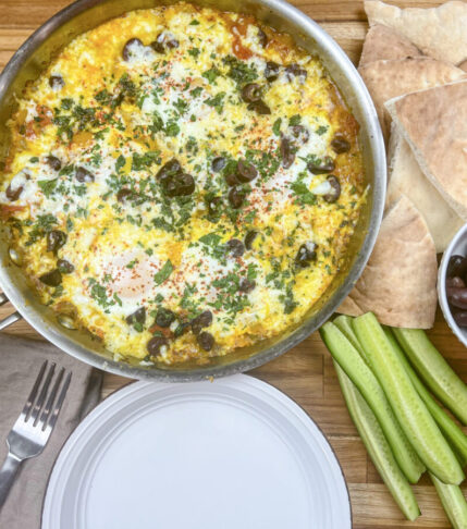 Shakshuka with Poached Eggs and Tomatoes.