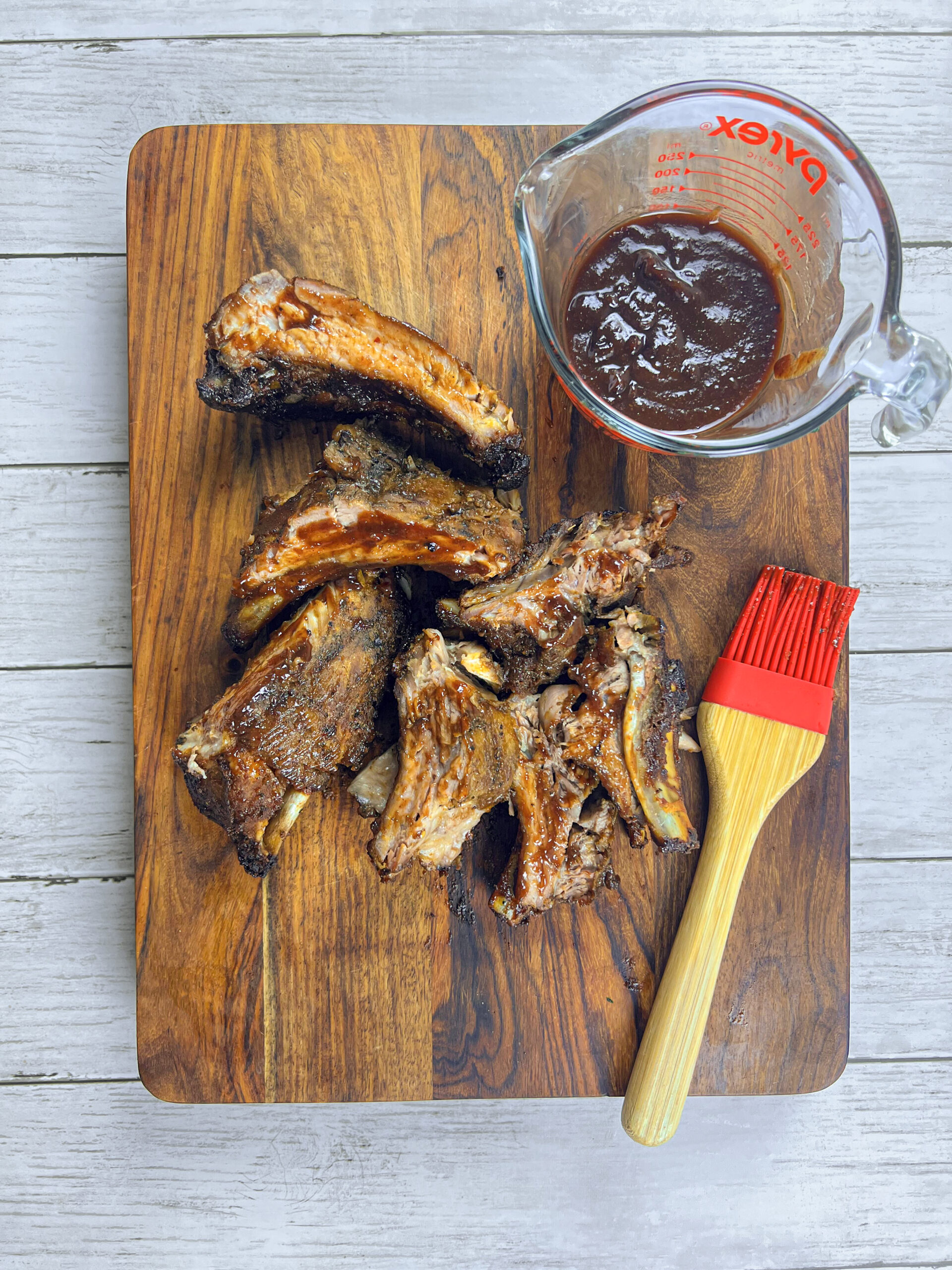 Baby Back Ribs Glazed With Pomegranate Molasses BBQ Sauce