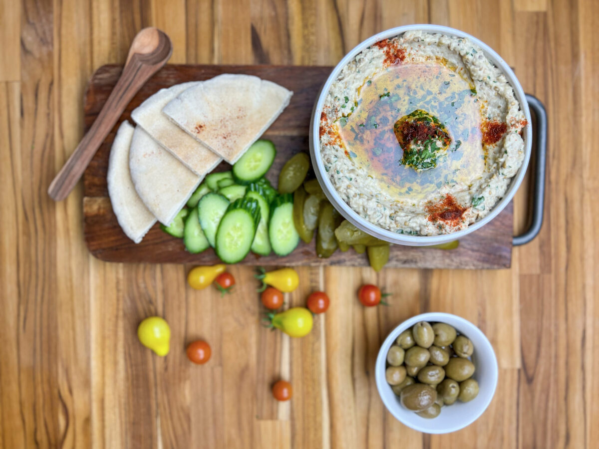 Mediterranean mountable dip platter with pita bread and olives