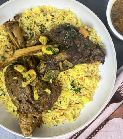 Braised Lamb Shanks on a Bed of Lebanese Rice Vermicelli with Flavorful Sauce