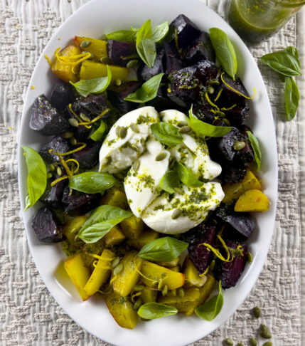 Roasted Beet and Burrata Salad on a white plate