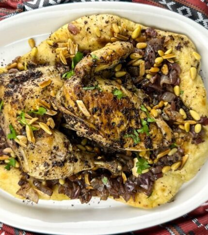 Palestinian Food Chicken Musakhan (Chicken, onions, and taboon bread with sumac)