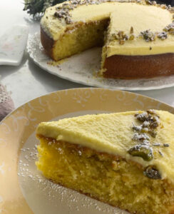 A Perfect Lemon Olive Oil Cake recipe with Lemon Curd and Mascarpone Topping, Garnished with Pistachios