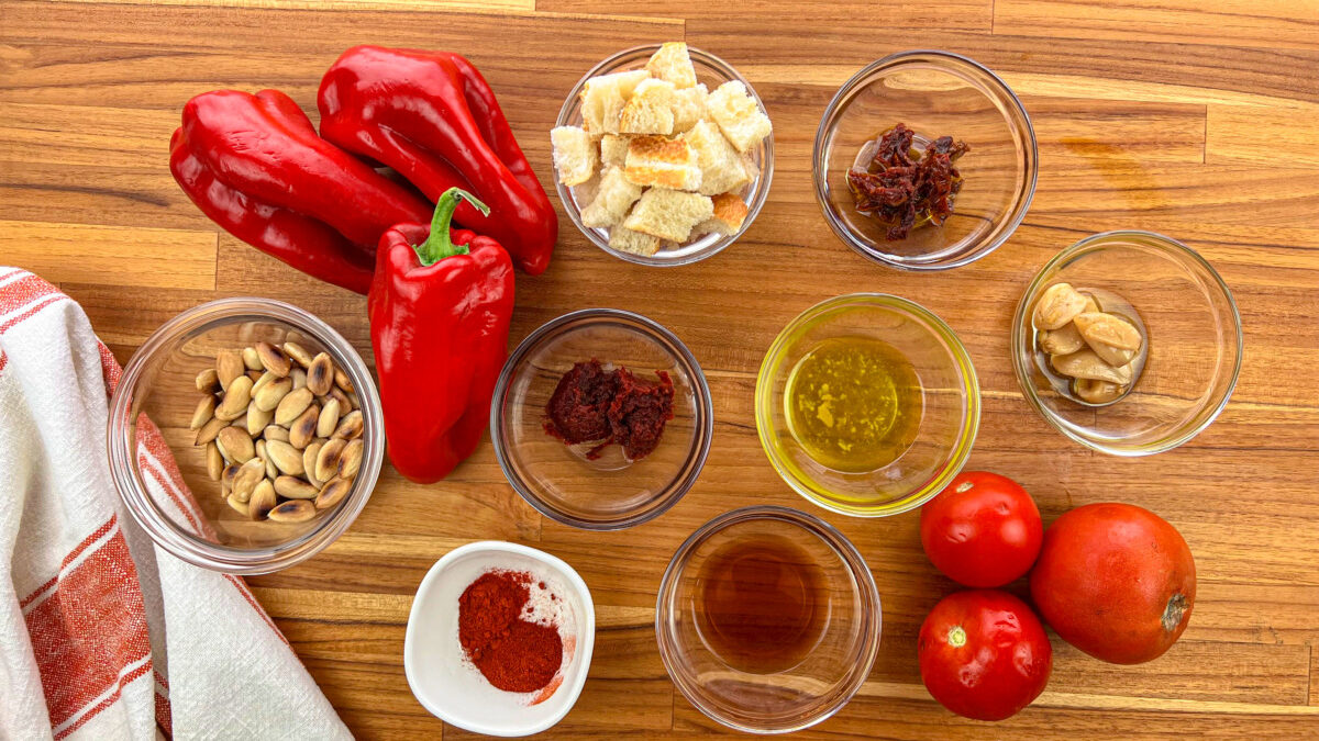 Fresh ingredients laid out for Romesco sauce preparation.
