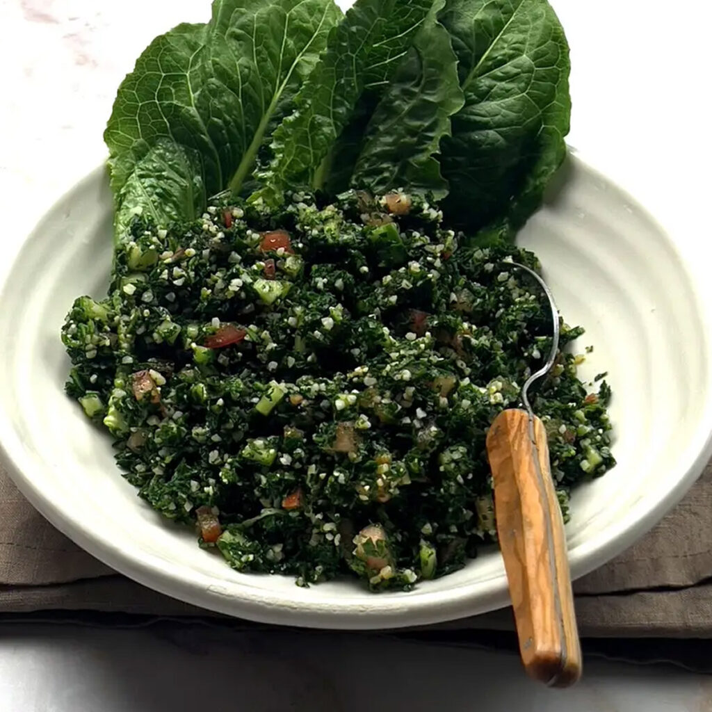 Traditional Tabbouleh Salad, an emblem of Mediterranean cuisine, featured in a roundup of 17 refreshing salad recipes.