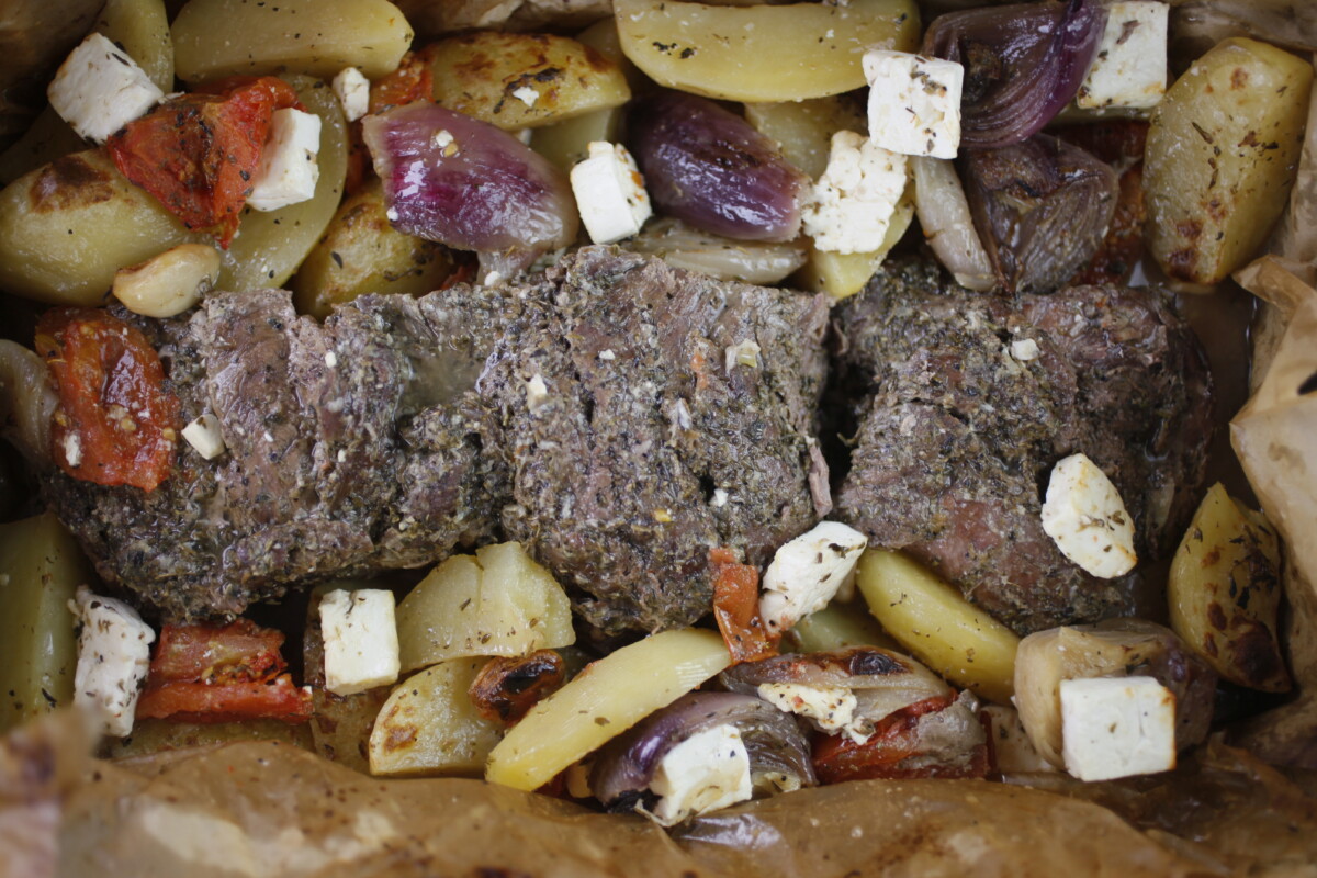 Final Flourish: Large Feta Pieces Added to Perfectly Cooked Greek Lamb Kleftiko in the Last 10 Minutes.