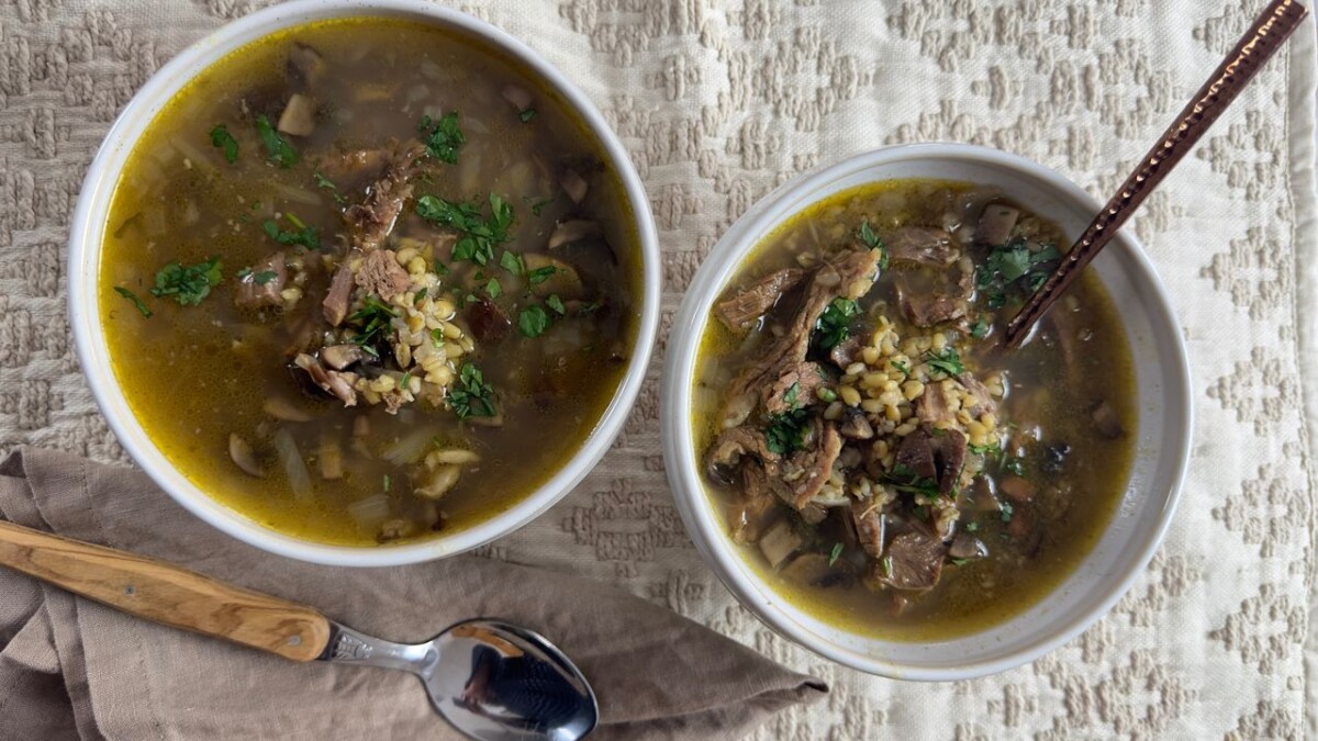 A hearty, grain-based soup made with freekeh, this dish has a unique nutty flavor and chewy texture, complemented by aromatic spices