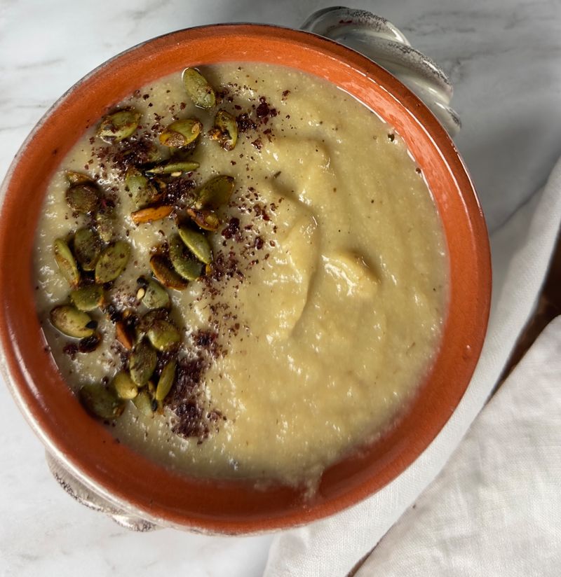  Creamy and silky, this vegan cauliflower soup is simple yet satisfying, offering a delightful combination of roasted cauliflower and garlic in a comforting base. 