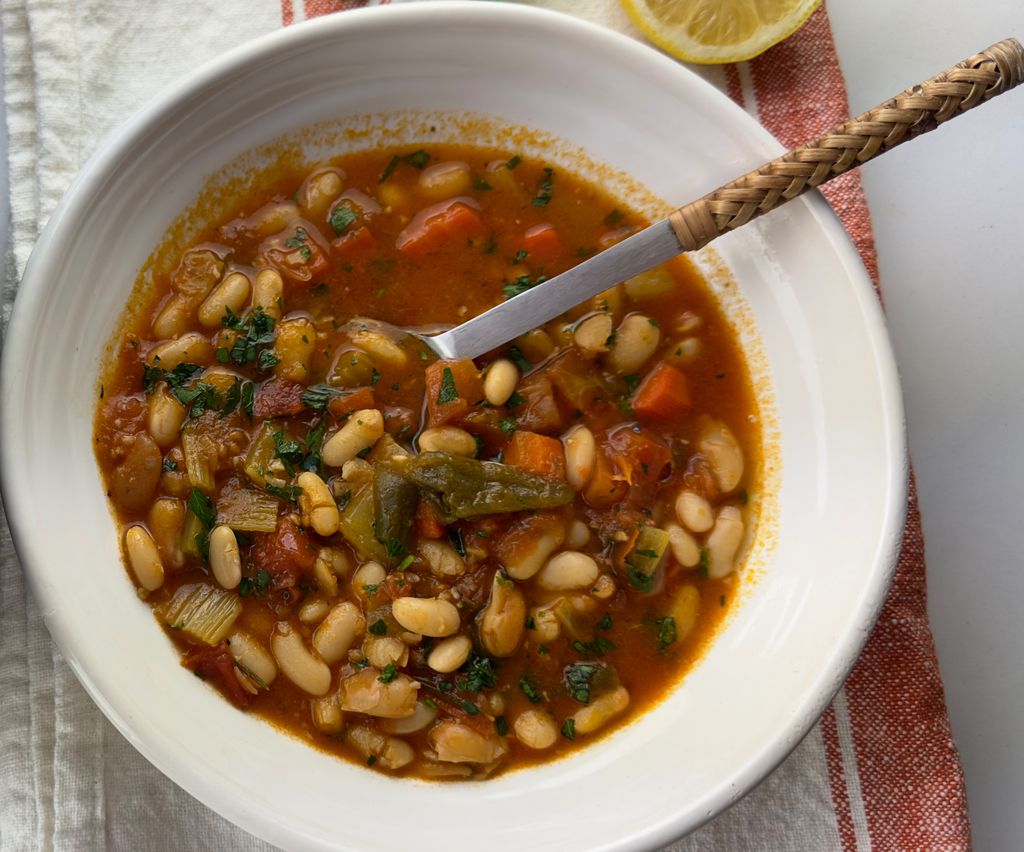  This beloved Greek bean soup is both filling and nourishing, combining white beans with vegetables in a herbed tomato broth for an authentic taste of the Mediterranean. 