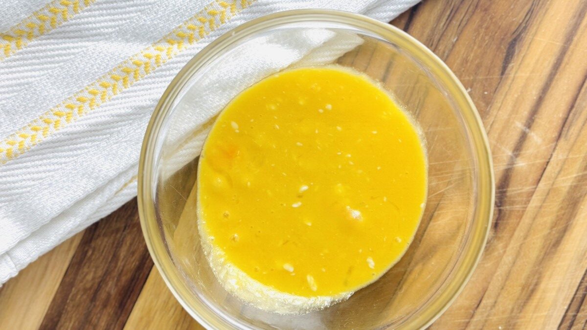 Egg, melted butter, and olive oil whisked together in a bowl for brushing phyllo dough.