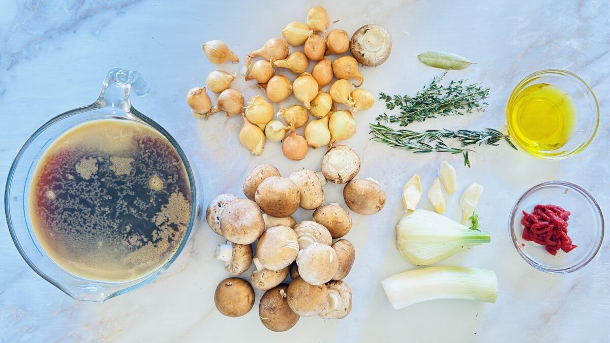 Beef broth, pearl onions, carrots, pancetta, and fresh rosemary for Beef Bourguignon stew